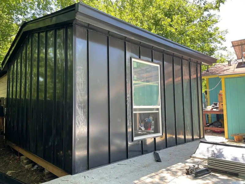 Black standing seam metal wall panels for Metal Roof Installation in Kerman