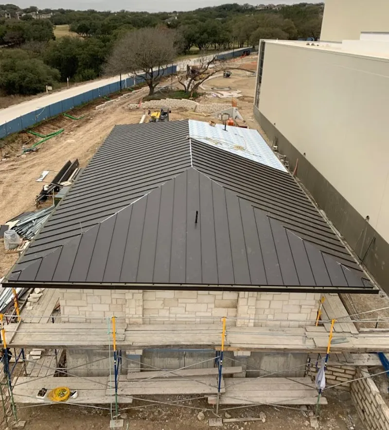 Metal roof new construction with scaffolding in Kerman